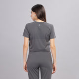 Back view of dark grey sweat-wicking jogger set for women.