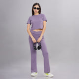 Front view of Purple crop top and jogger set, women's nylon activewear.