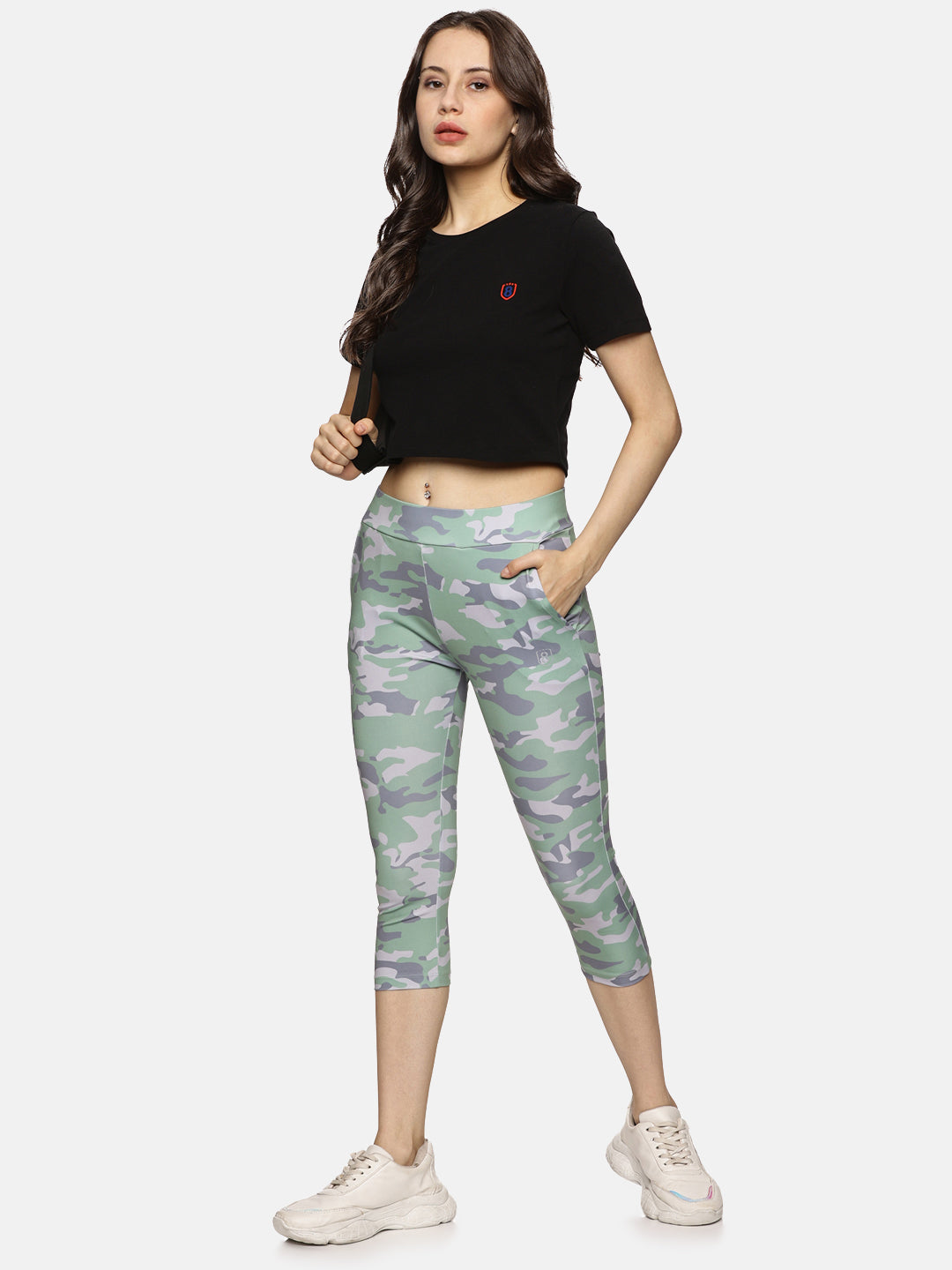 Front view of black cotton spandex crop top, highlighting a sleek fit and breathable fabric.