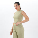 Front view of light green joggers and crop top set, highlighting a trendy and relaxed fit.