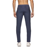 Close-up of men’s track pants in navy blue with zipper closure