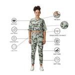Close-up of camouflage fabric texture and stitching details on the tracksuit.