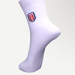 White nylon ankle socks displayed flat-lay, highlighting breathable and sweat-wicking fabric.