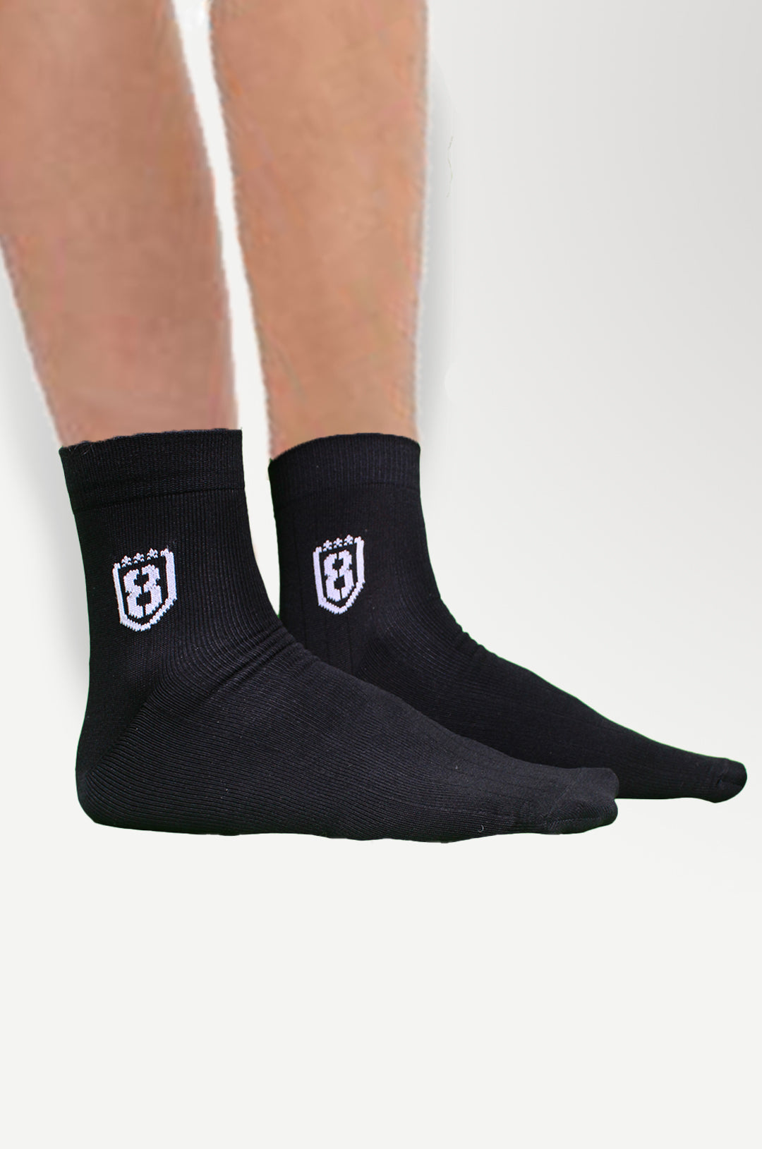 Set of black nylon socks, perfect for both athletic and casual wear.