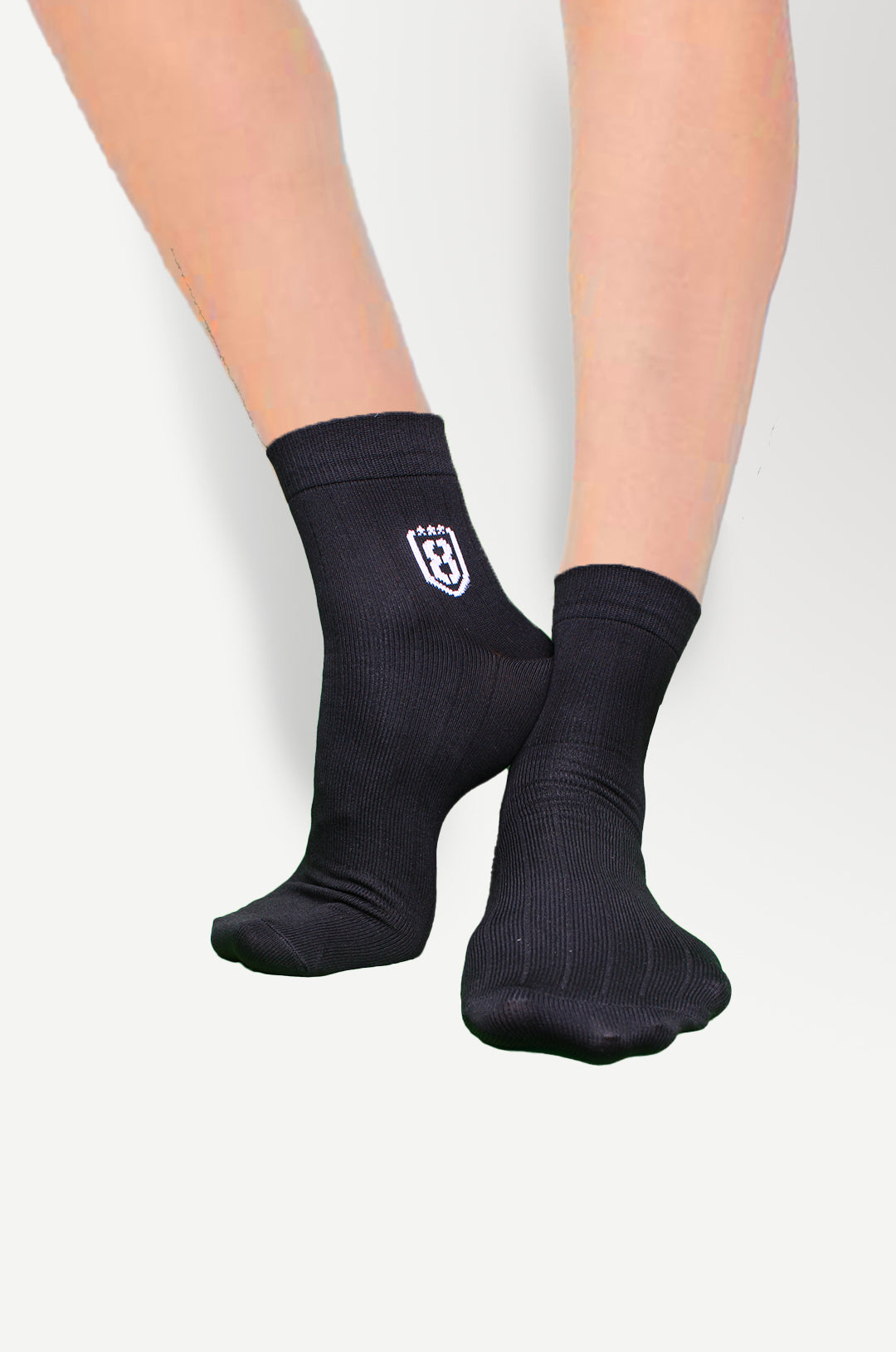 White nylon ankle socks displayed flat-lay, highlighting breathable and sweat-wicking fabric.