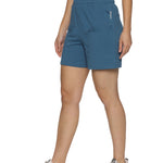 Close-up of side slit design on women's grey sports shorts.