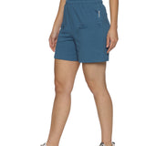 Close-up of side slit design on women's grey sports shorts.