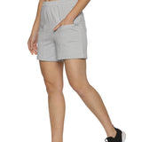 Front view of grey sports shorts for women with an elastic waistband.