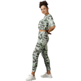 Side profile of women's camo tracksuit with a comfortable boxy fit.