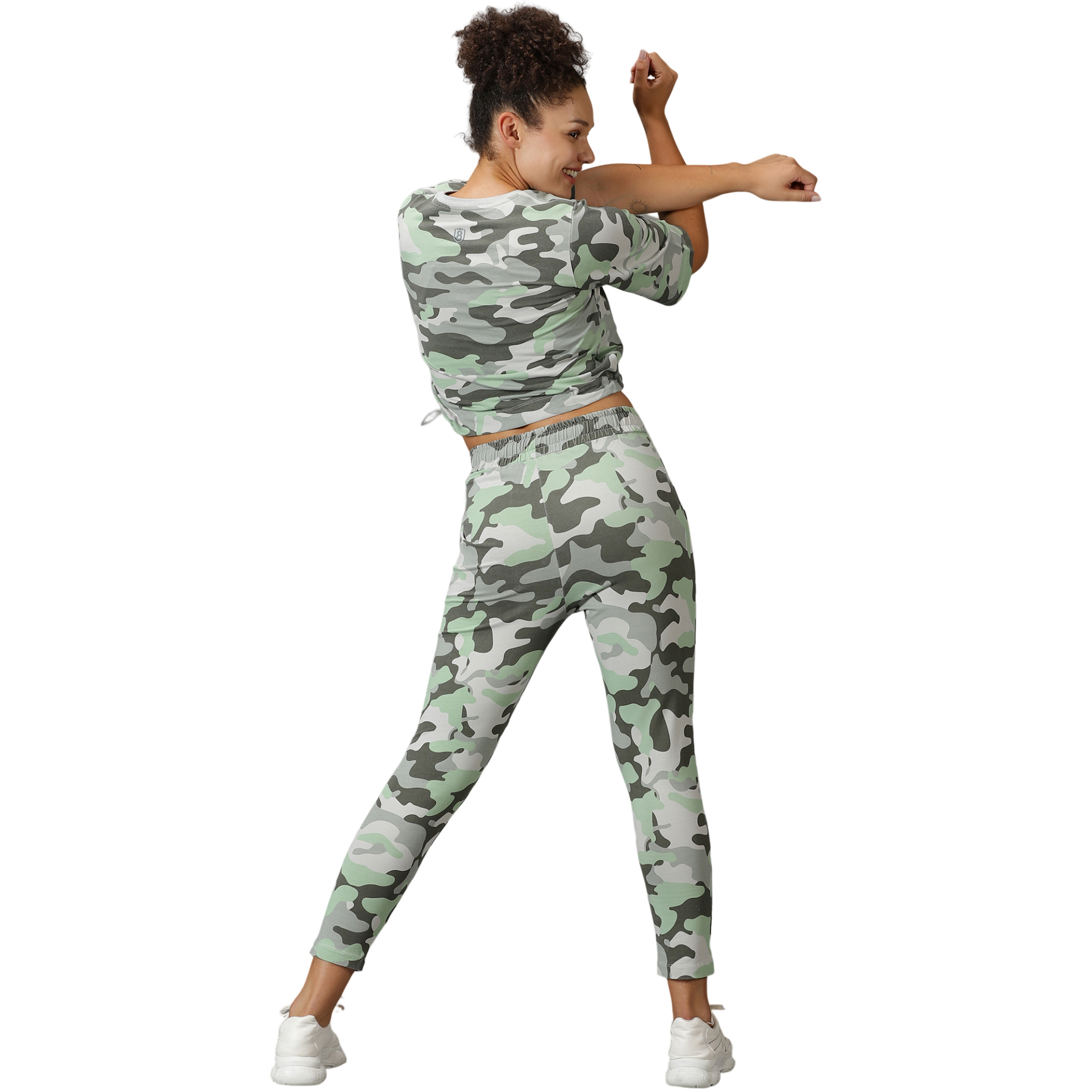Back view of camo tracksuit for women showcasing the stylish print.