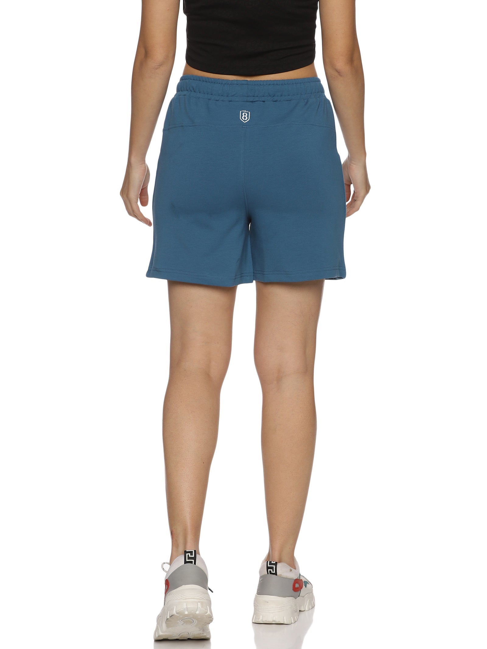 Back view of women's grey training shorts showcasing a comfortable fit.