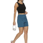 Detailed view of elastic waistband for a secure fit on women's shorts.