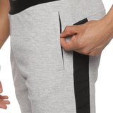 Side profile of men's grey gym shorts designed for workouts.