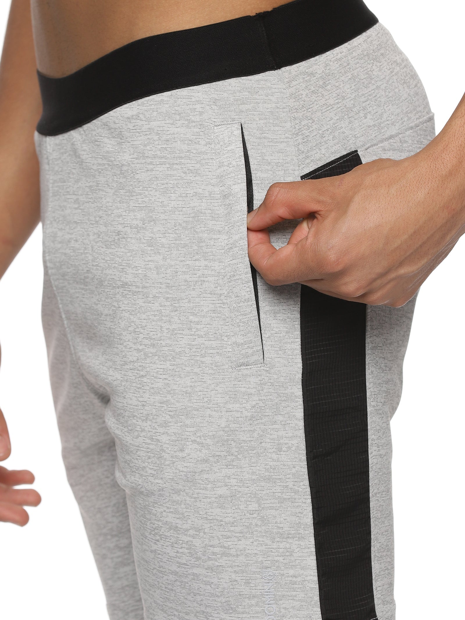 Side profile of men's grey gym shorts designed for workouts.