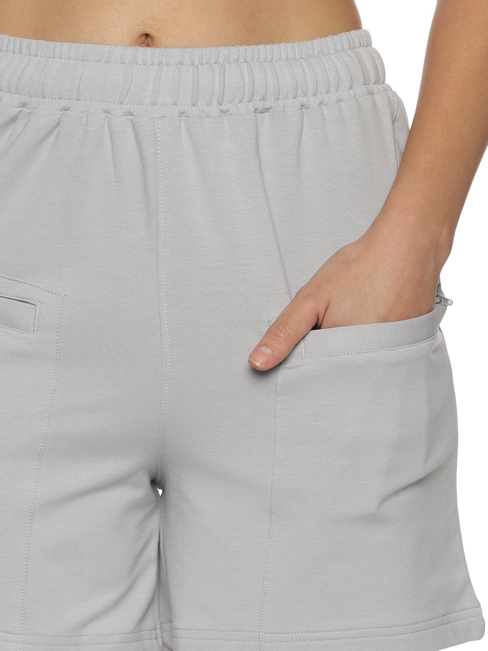 Back view of women's grey training shorts showcasing a comfortable fit.