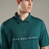 Dropped Shoulder Half-Zip Polo T Shirt with minimal graphic print