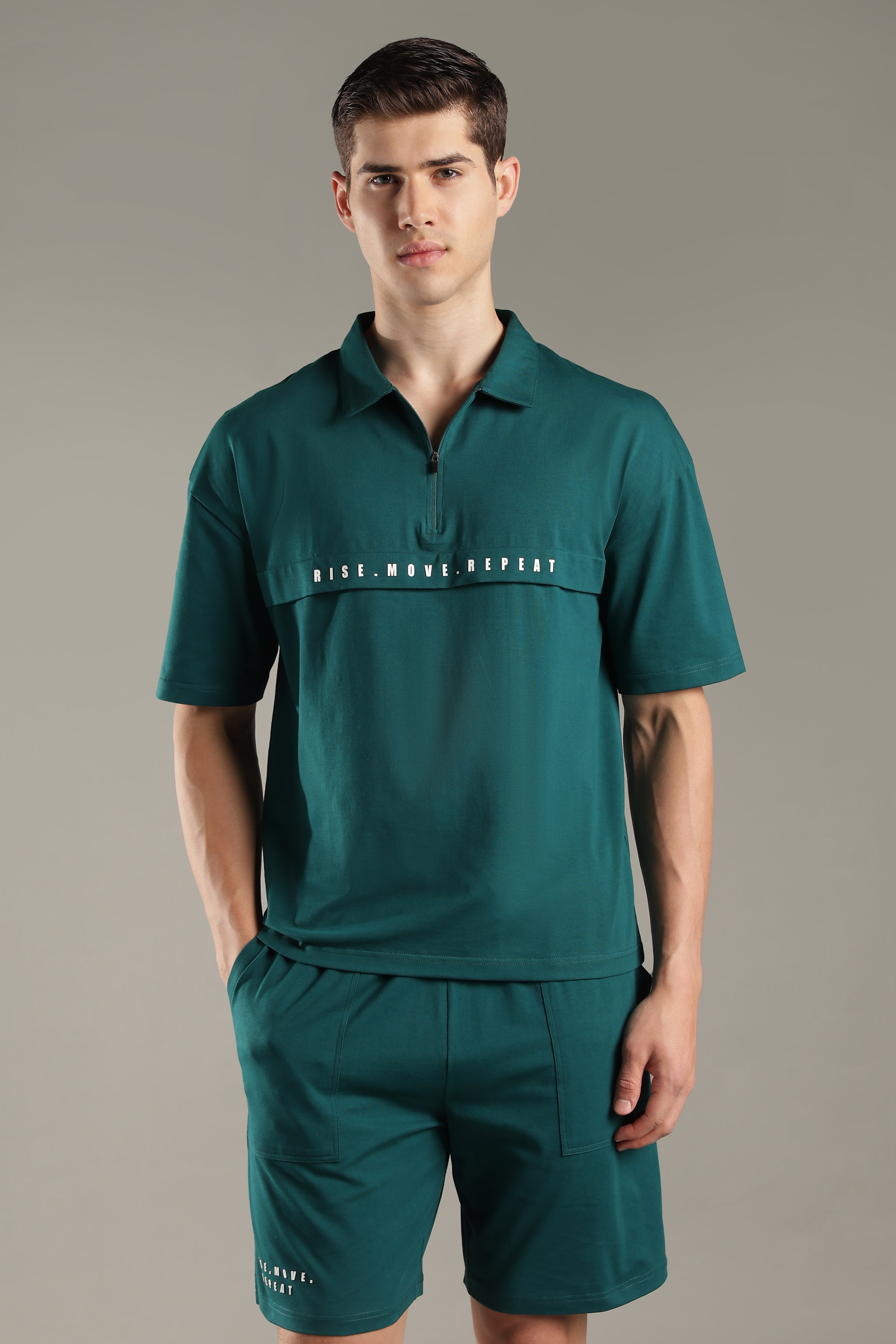 Dropped Shoulder Half-Zip Polo T Shirt with minimal graphic print