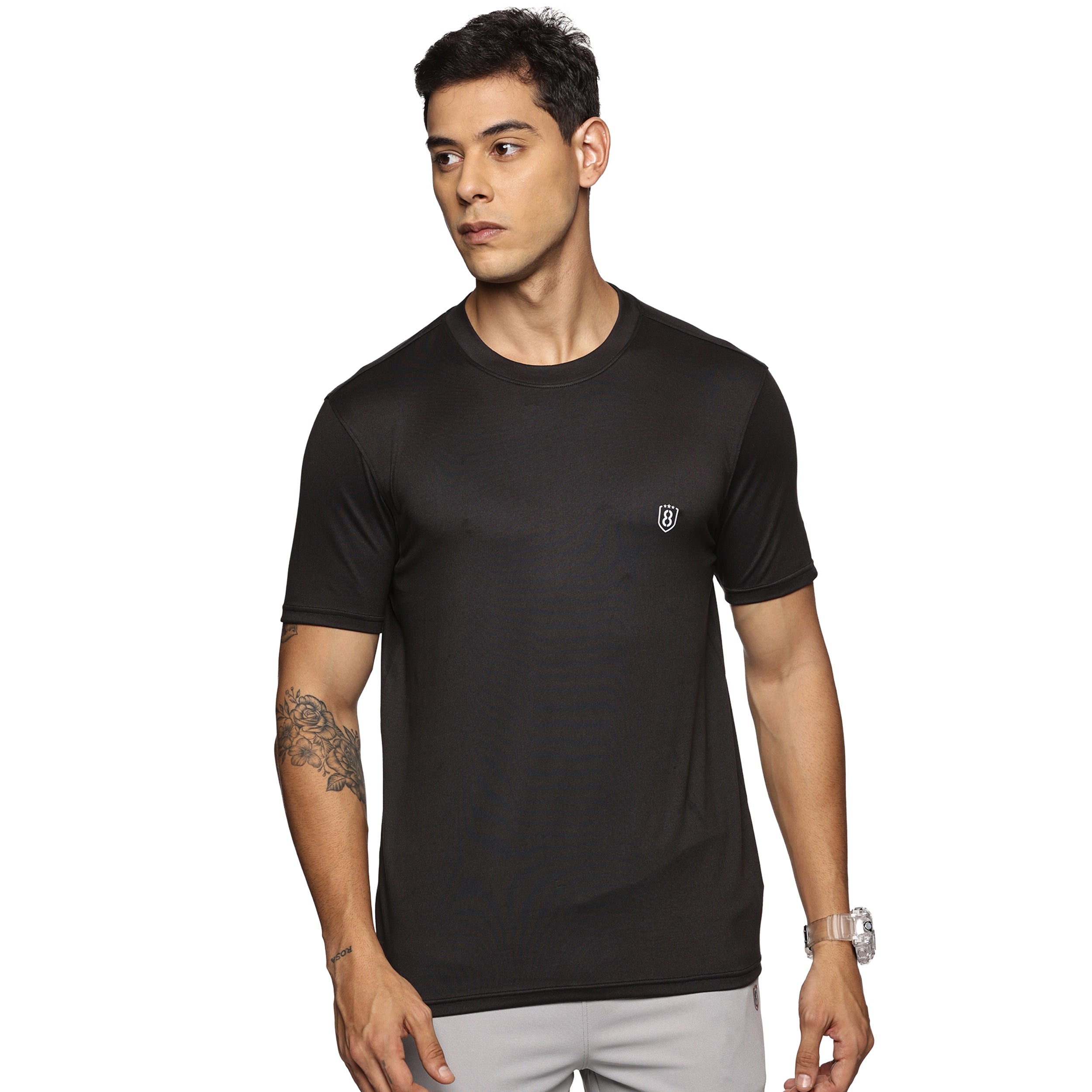 Model wearing the black t-shirt during a workout