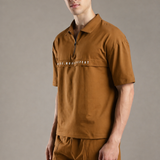 Dropped Shoulder Half-Zip Polo T Shirt with minimal graphic print