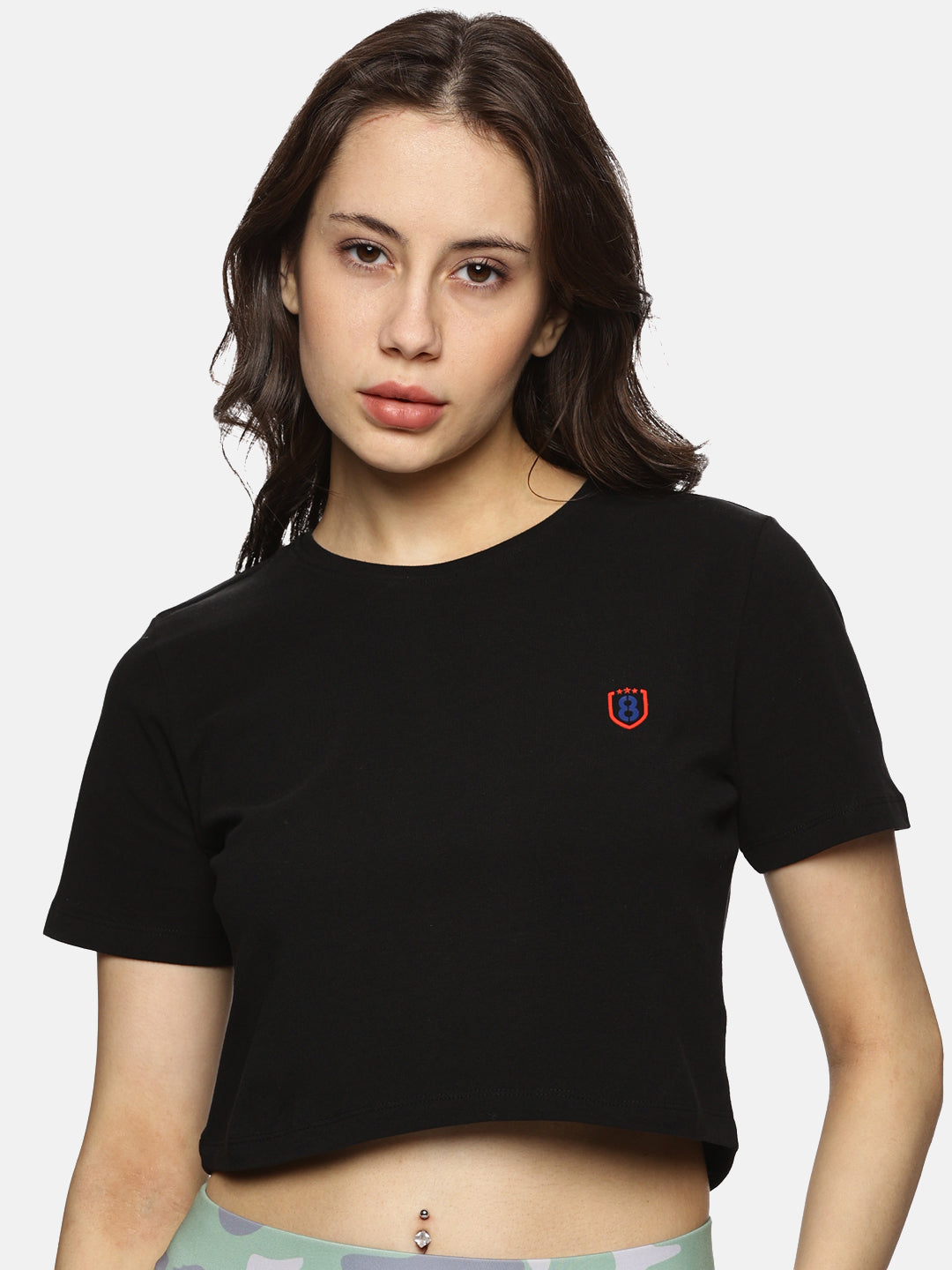 Black short-sleeve spandex crop top for women, designed for gym workouts and everyday wear.