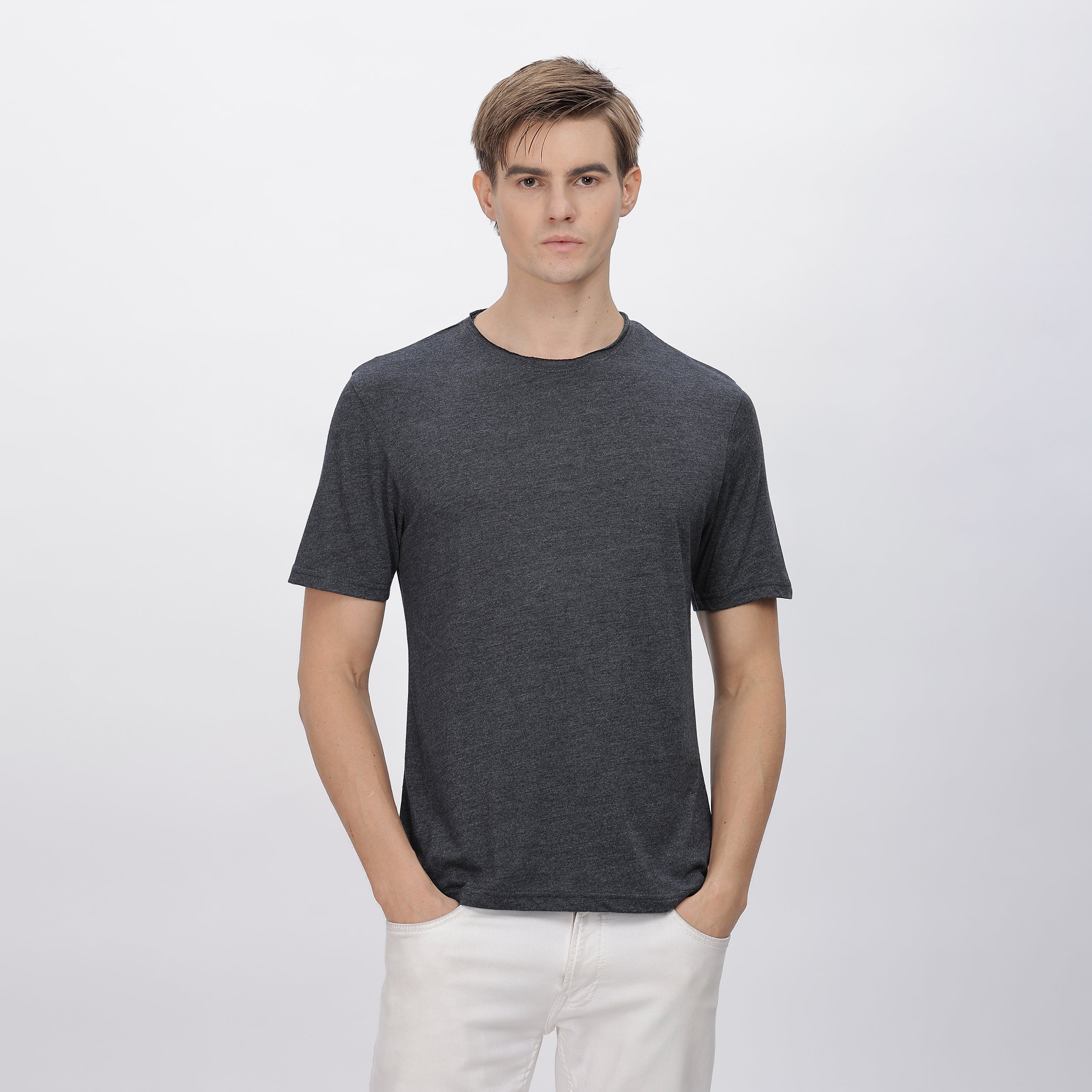 Versatile grey polyester shirt for men, suitable for work, travel, and casual outings.