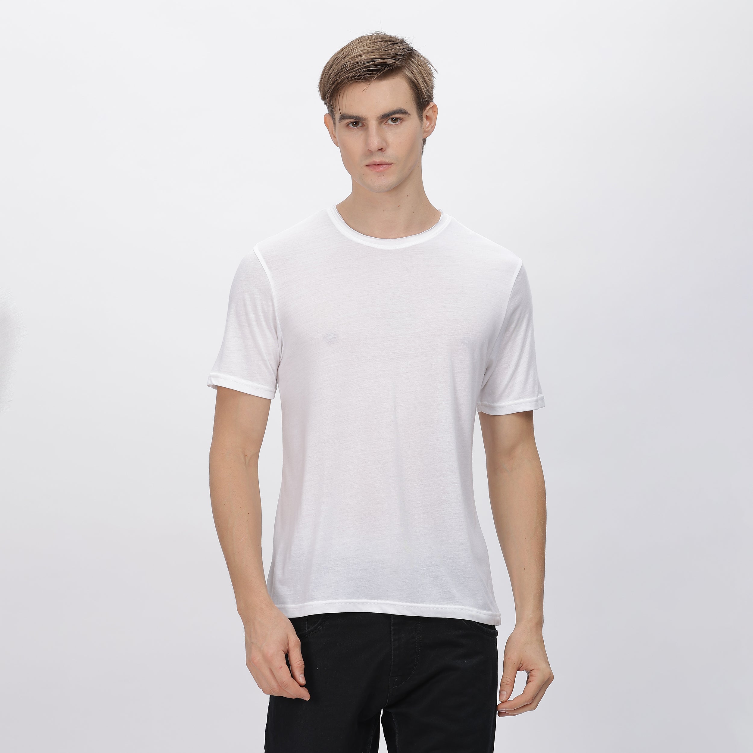  White polyester shirt, displaying its lightweight and quick-dry fabric.