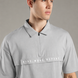 Dropped Shoulder Half-Zip Polo T Shirt with minimal graphic print
