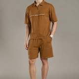 Dropped Shoulder Half-Zip Polo T Shirt with minimal graphic print