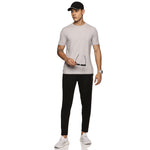 Close-up of men's black track pants – premium quality material
