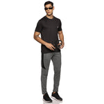 Close-up of men's cut & sew track pants – sporty and trendy look