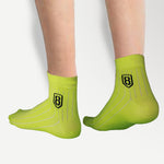 Close-up of neon high ankle socks – trendy and breathable