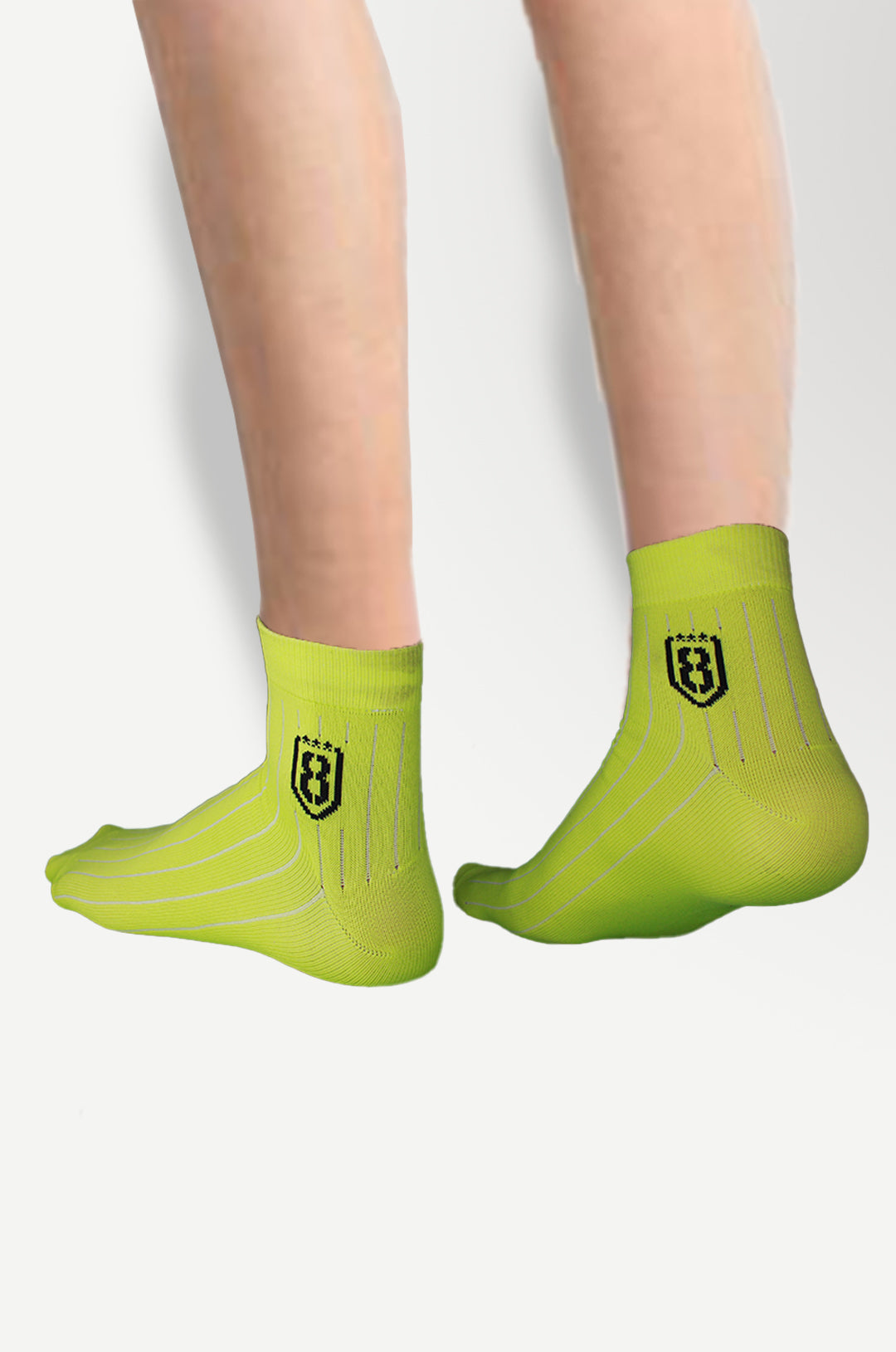 Close-up of neon high ankle socks – trendy and breathable