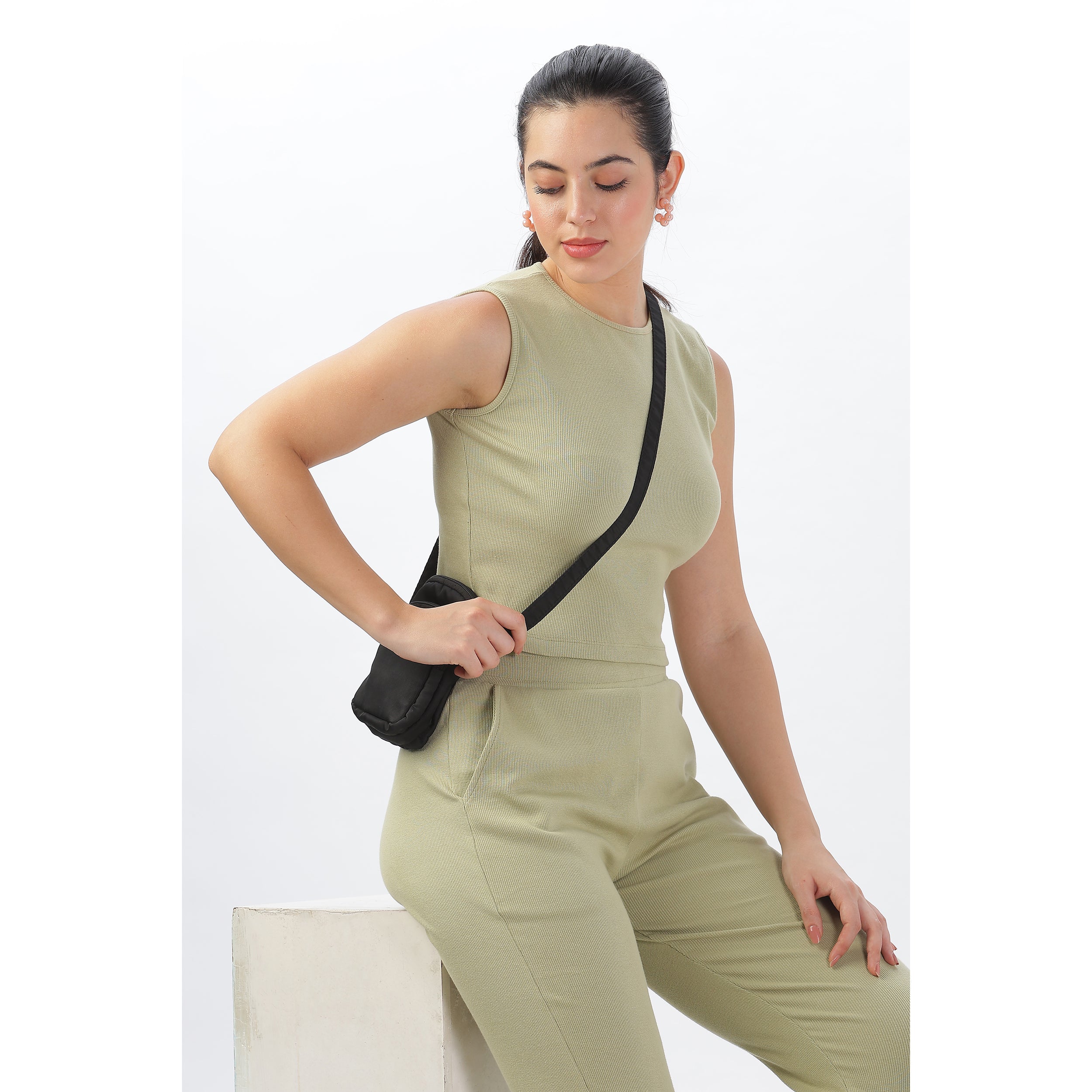 Light green crop top and joggers set, designed for workouts, lounging, or everyday wear.