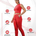 Red joggers and crop top set, displaying modern design and breathable fabric.