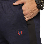 Side view of men’s slim fit track pants with contrasting panels