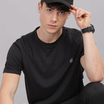 Side view of modern black co-ord set with matching shorts for men
