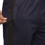 Stretchable slim fit track pants for men with cut & sew pattern