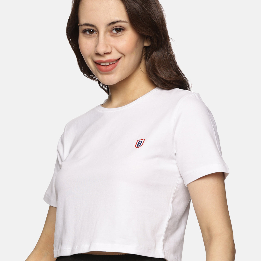 women’s spandex crop top in white, displaying fabric softness and durability.