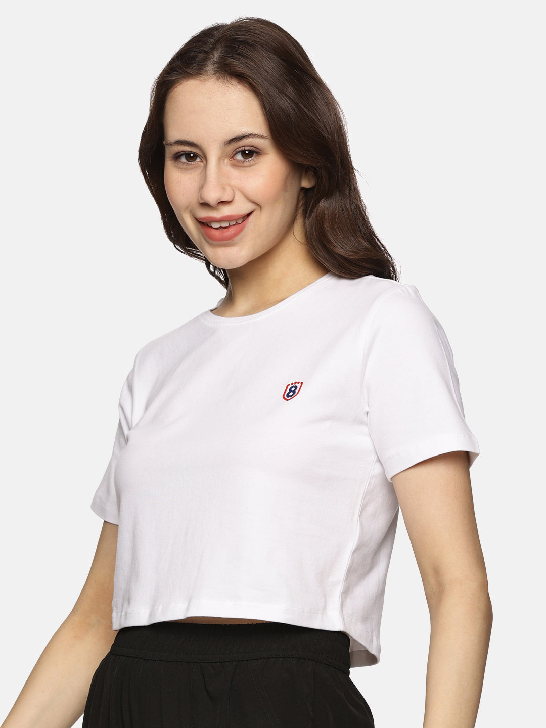 women’s spandex crop top in white, displaying fabric softness and durability.
