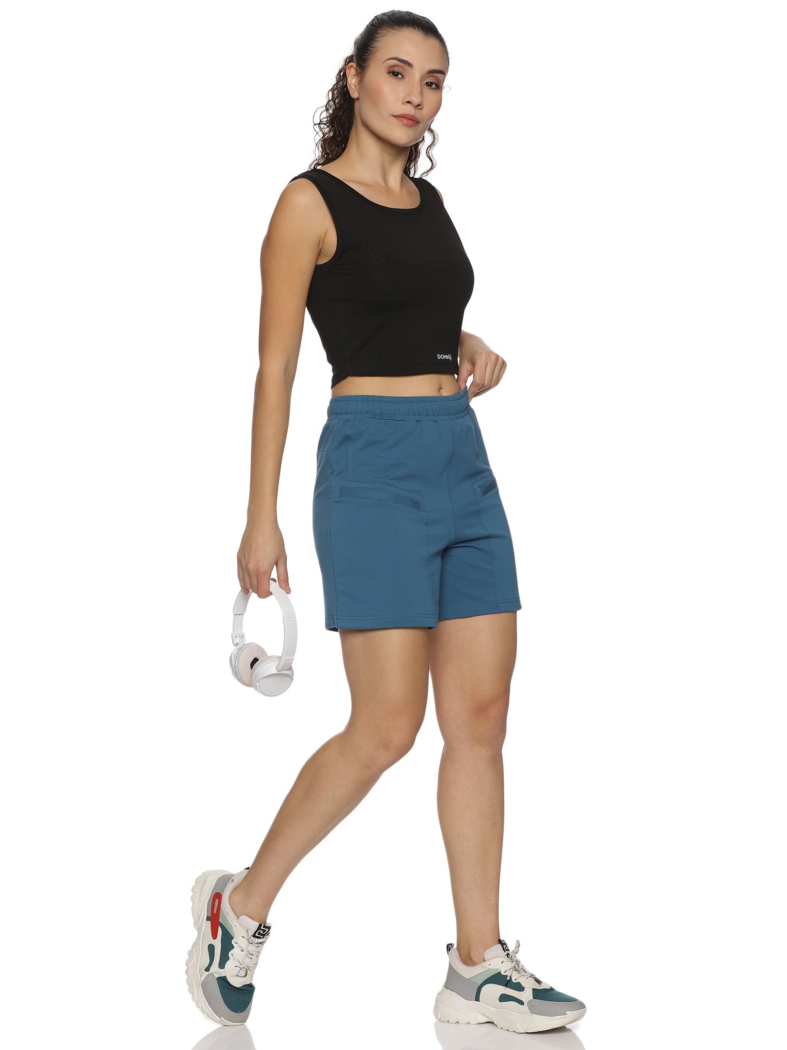 Detailed view of elastic waistband for a secure fit on women's shorts.