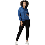 Front view of blue sports jacket for women with cozy quilted design